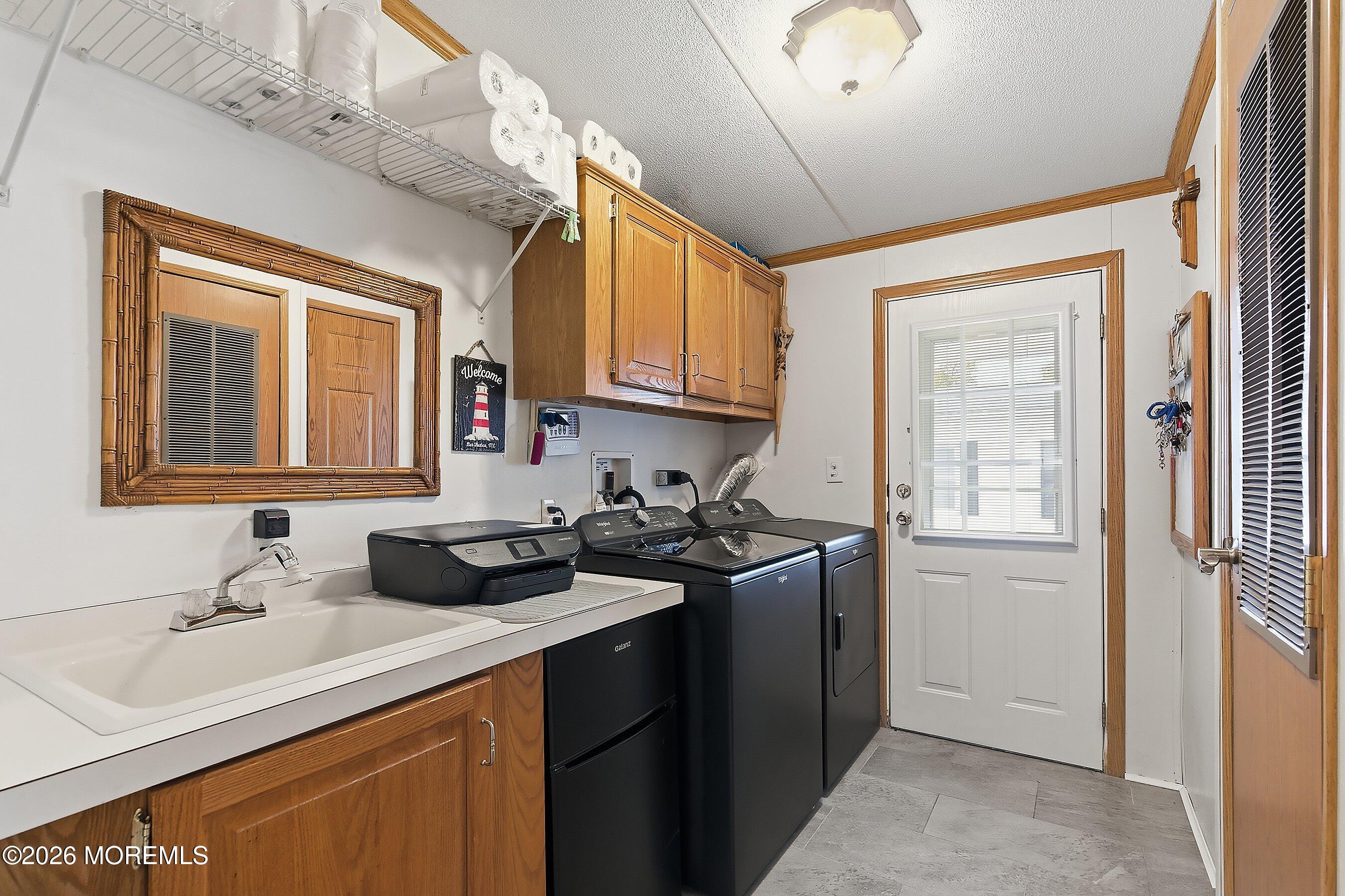 536 Momosa Way Whiting, NJ 08759 - Photo 20 of 54 a kitchen with a sink cabinets and a window