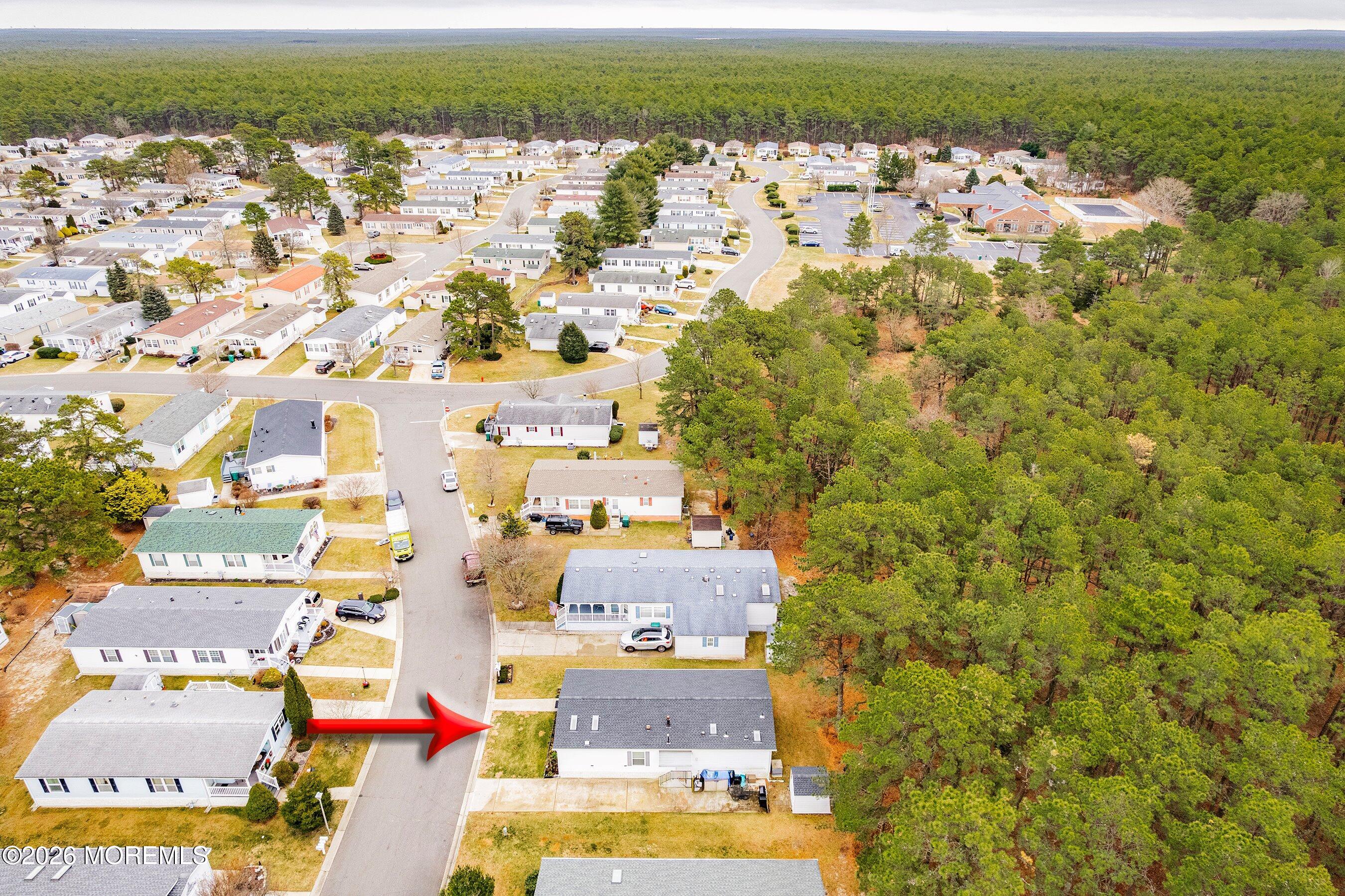 536 Momosa Way Whiting, NJ 08759 - Photo 32 of 54 an aerial view of residential houses with outdoor space