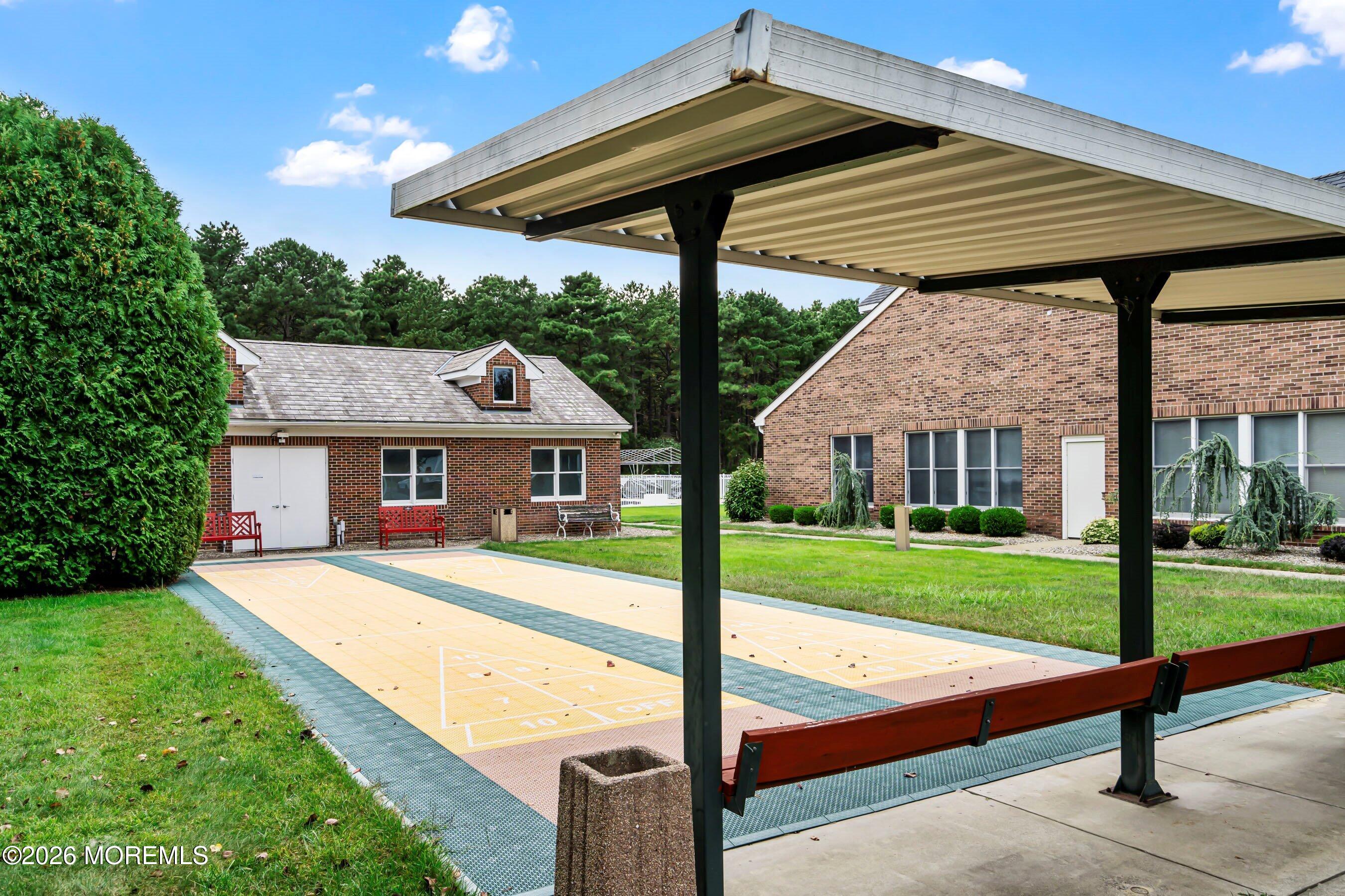 536 Momosa Way Whiting, NJ 08759 - Photo 50 of 54 a front view of a house with yard