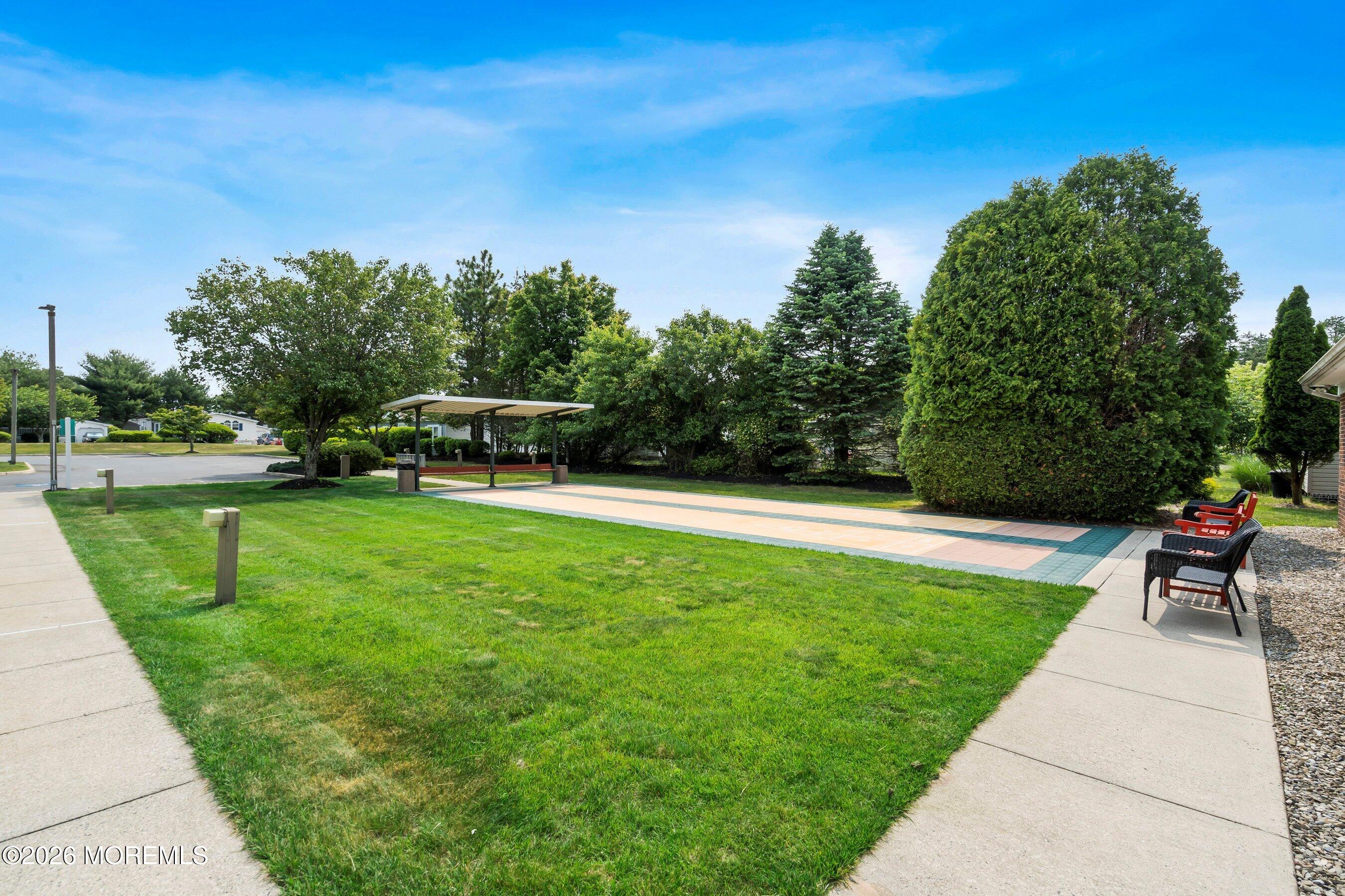 536 Momosa Way Whiting, NJ 08759 - Photo 51 of 54 a view of a garden with sitting area