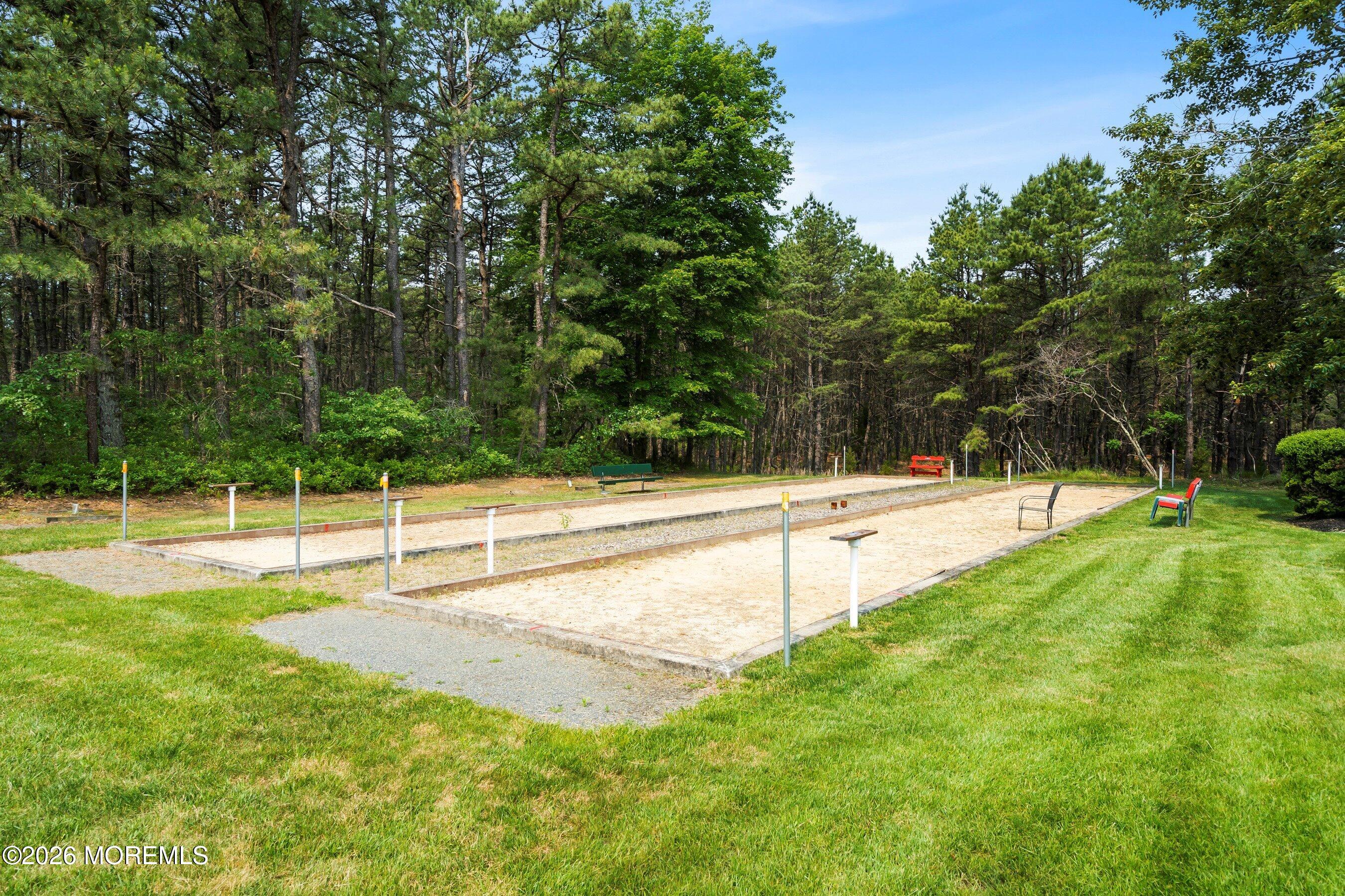 536 Momosa Way Whiting, NJ 08759 - Photo 53 of 54 a view of a swimming pool with a yard