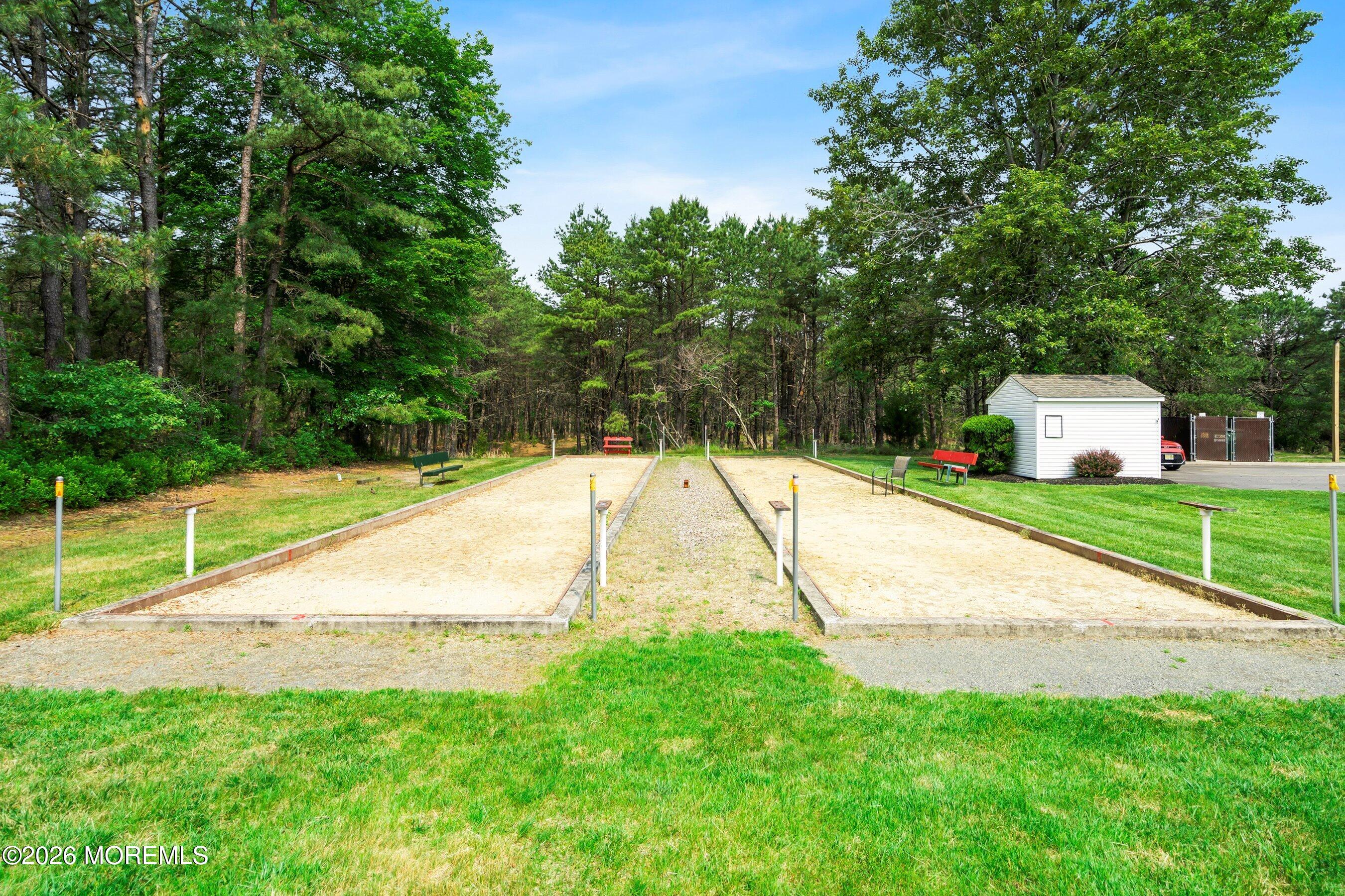 536 Momosa Way Whiting, NJ 08759 - Photo 54 of 54 a view of a swimming pool with a park
