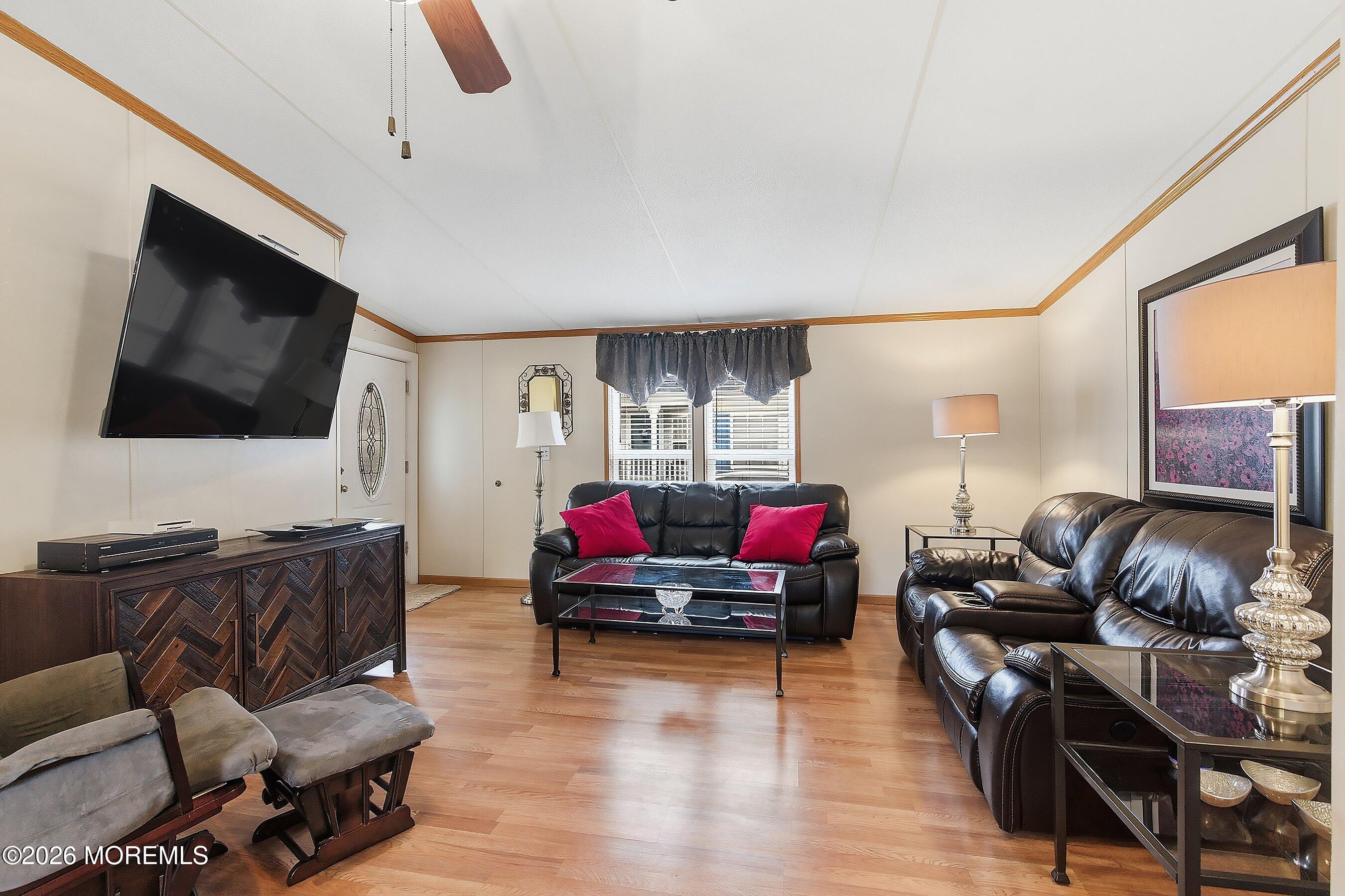 536 Momosa Way Whiting, NJ 08759 - Photo 9 of 54 a living room with furniture and a flat screen tv