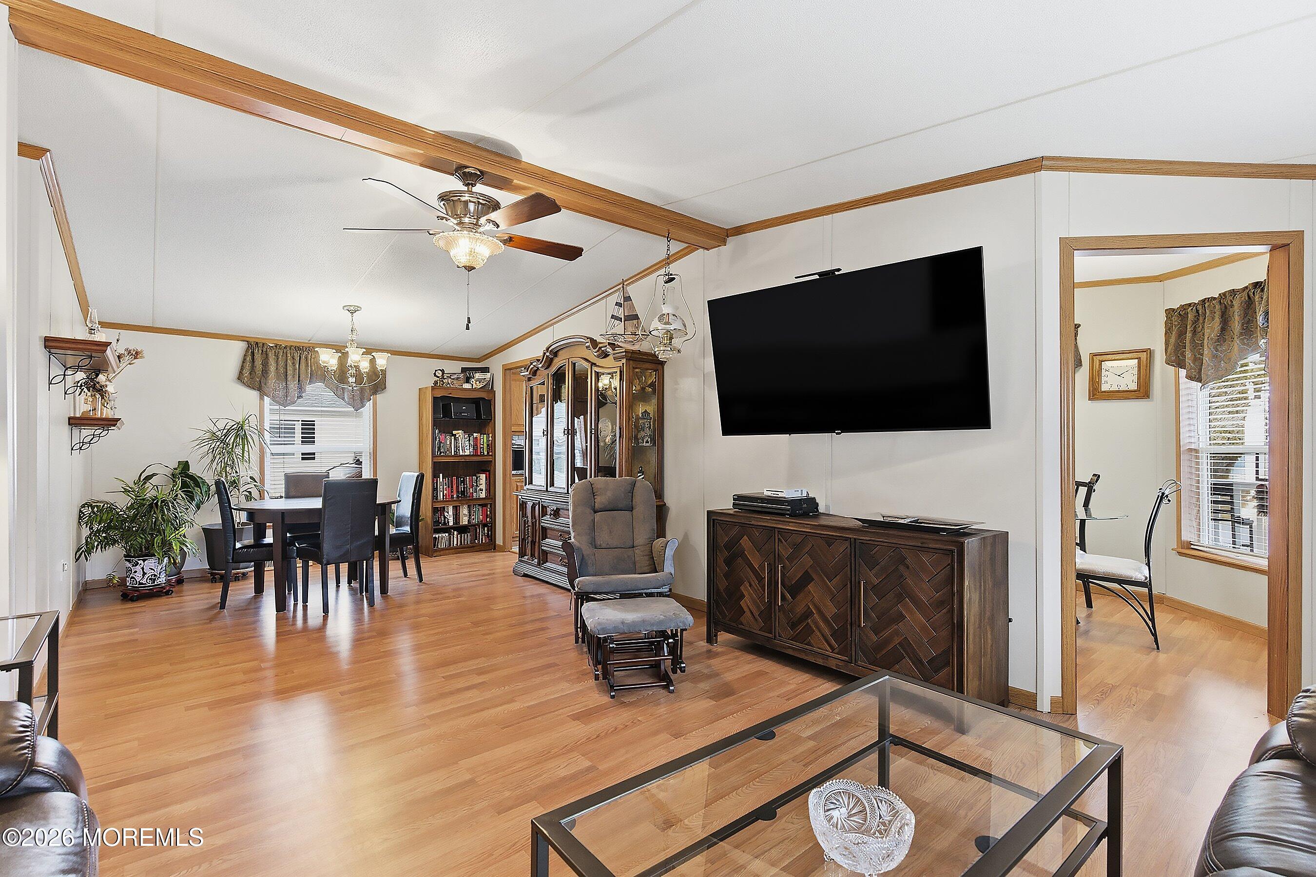 536 Momosa Way Whiting, NJ 08759 - Photo 10 of 54 a living room with furniture and a flat screen tv