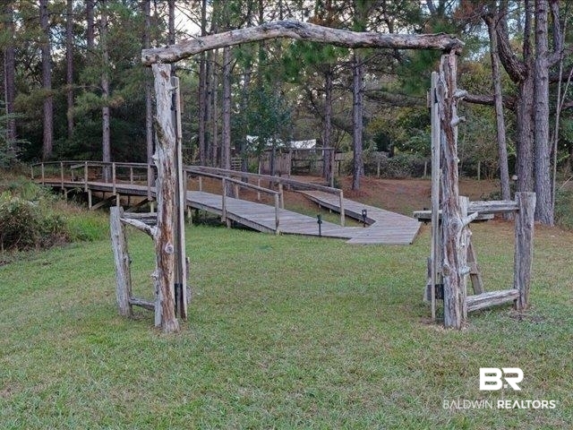 4650 Wiggins Lane Wilmer, AL 36587 - Photo 37 of 66 View of playground featuring a yard