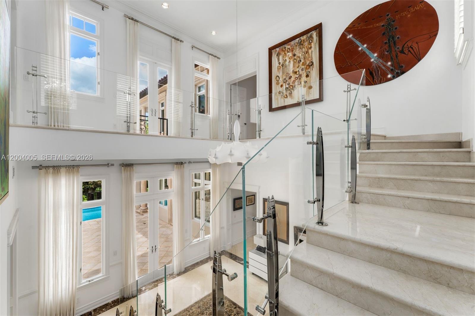 255 Cocoplum Road Coral Gables, FL 33143 - Photo 19 of 29 a view of entryway with a front door
