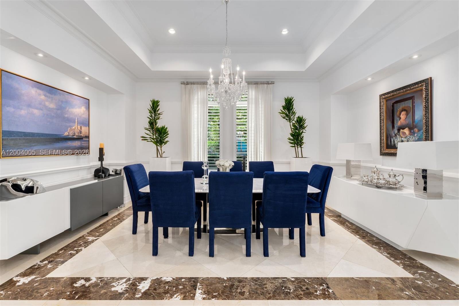 255 Cocoplum Road Coral Gables, FL 33143 - Photo 7 of 29 a view of a a dining room with furniture window and wooden floor