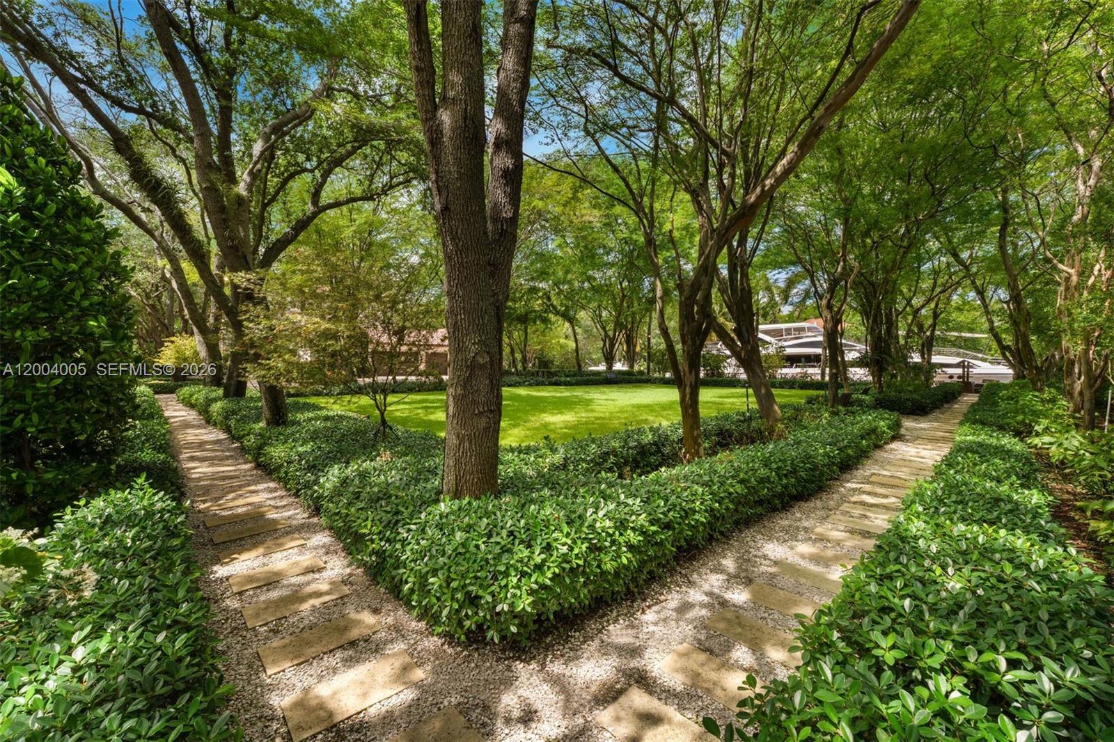 255 Cocoplum Road Coral Gables, FL 33143 - Photo 10 of 29 a view of a park with large trees