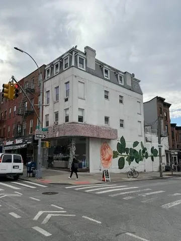 a view of a building and a street