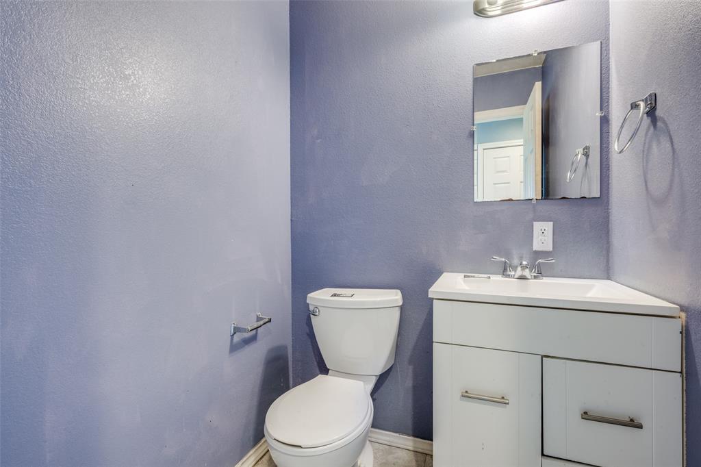 970 McReynolds Road Sanger, TX 76266 - Photo 9 of 25 The powder bath is conviently located on the first floor