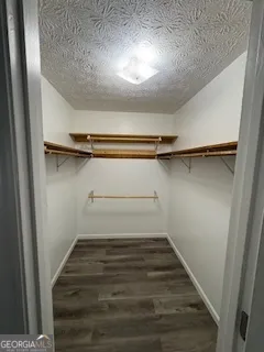 a view of a room with racks on the wall