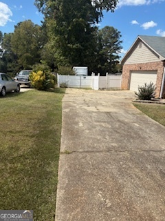 545 Southmoor Circle Stockbridge, GA 30281 - Photo 3 of 19 a view of a house with a yard