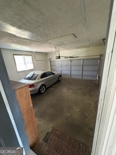 545 Southmoor Circle Stockbridge, GA 30281 - Photo 7 of 19 a view of garage with a car parked in it