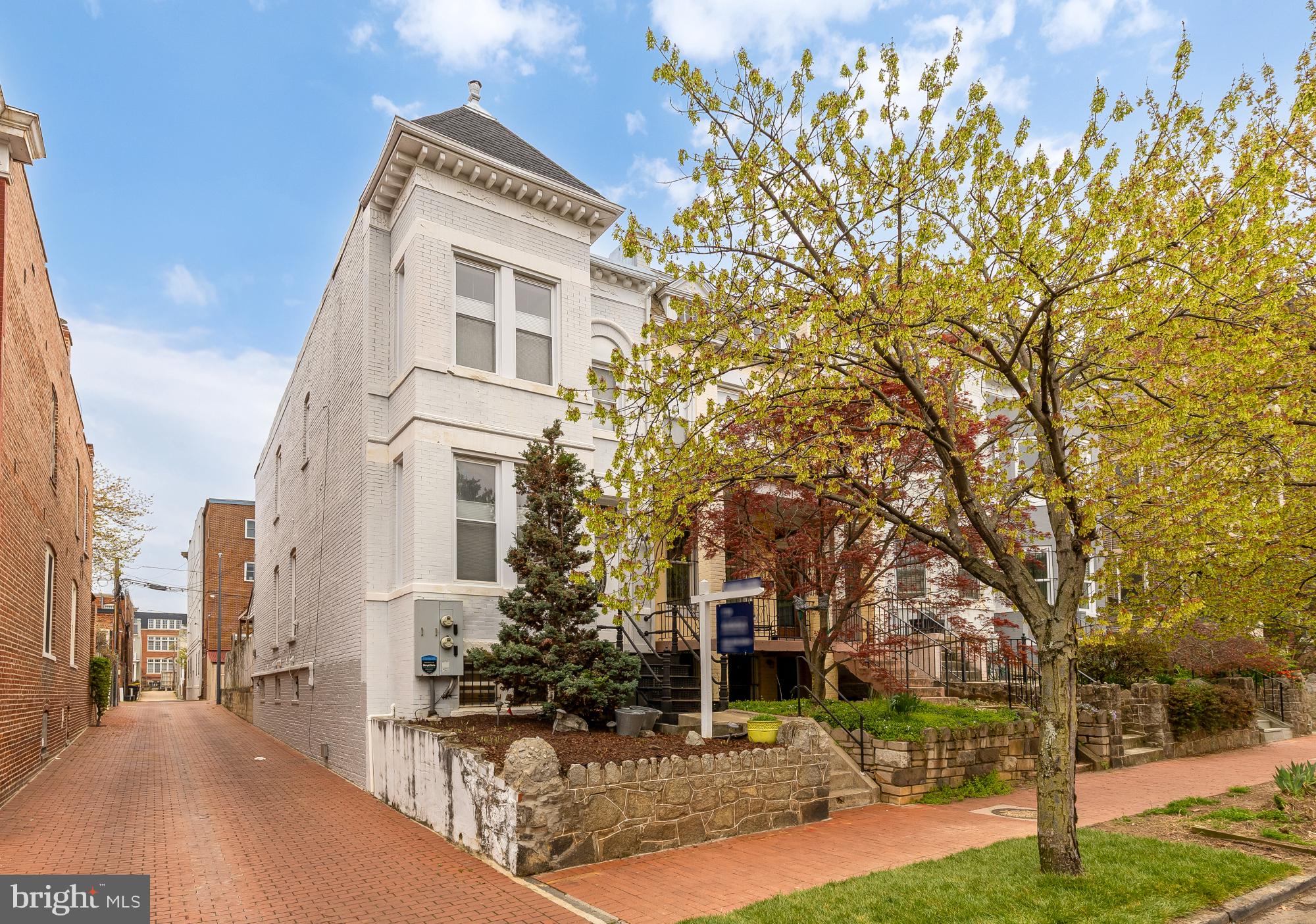 a view of a building with a yard