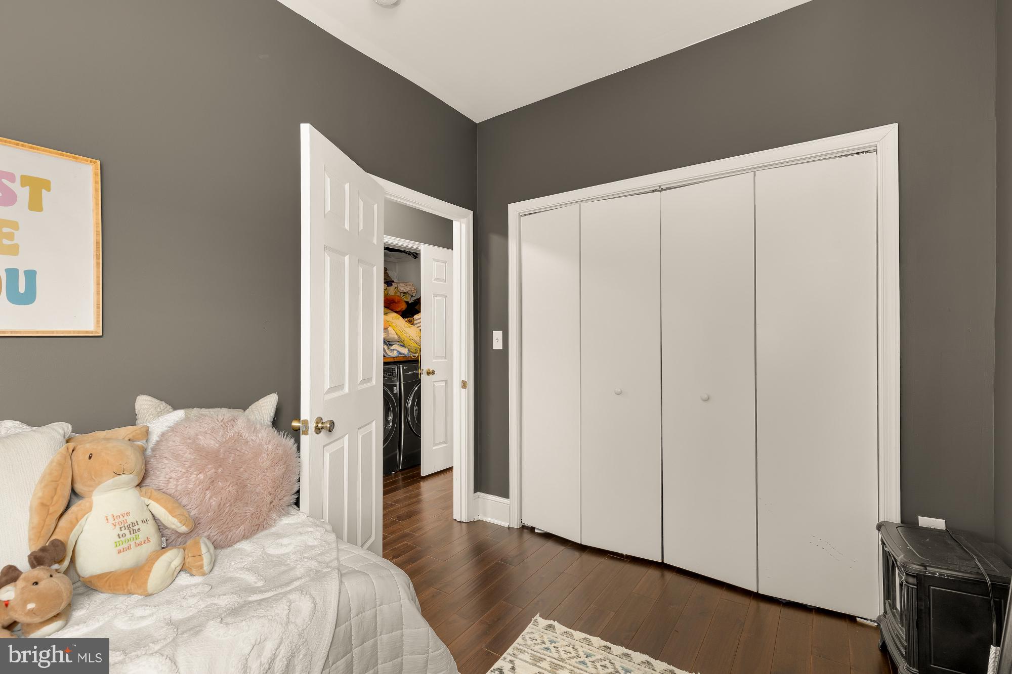 421 10th Street Northeast Washington, DC 20002 - Photo 32 of 61 a bedroom with a bed and a night stand