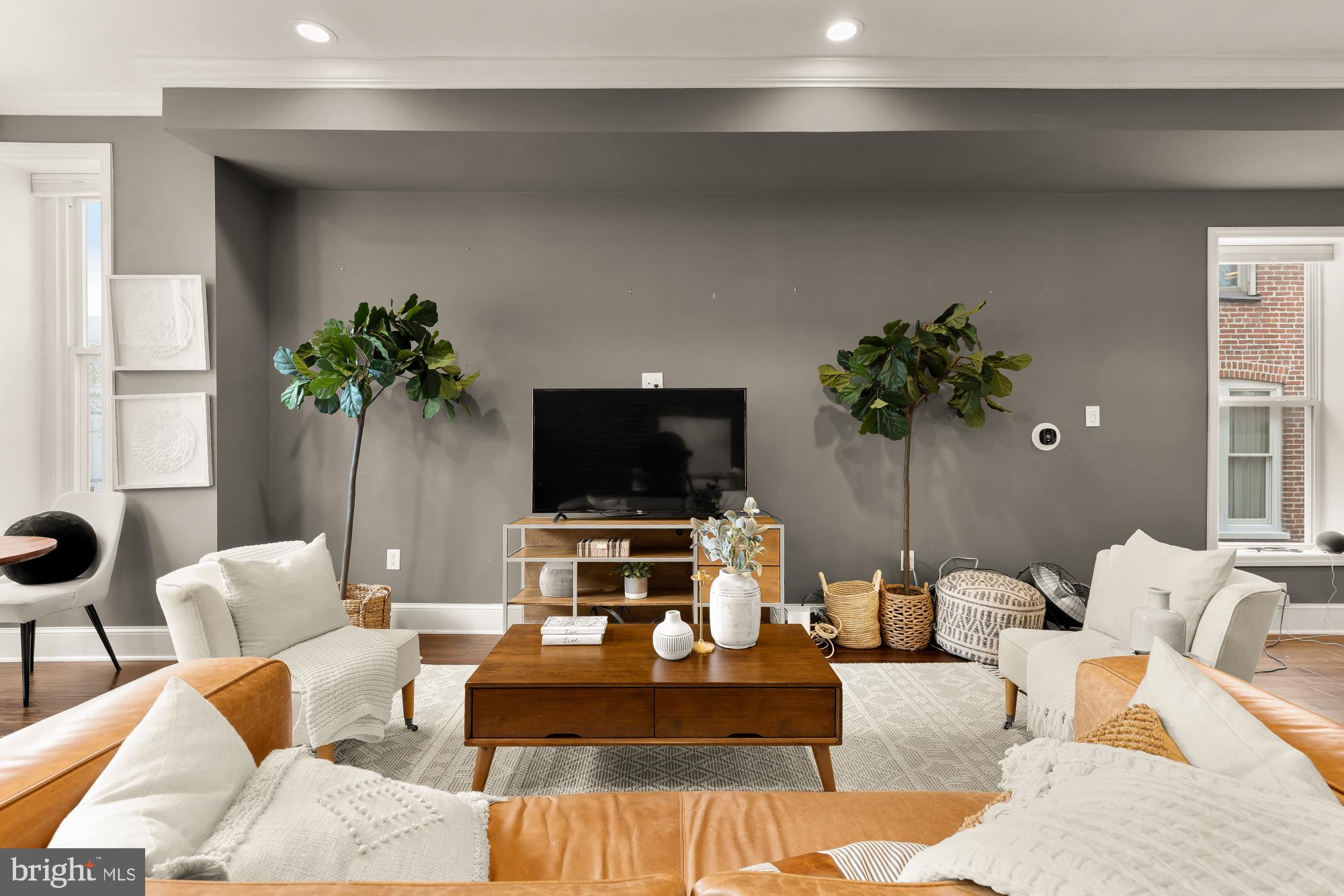 421 10th Street Northeast Washington, DC 20002 - Photo 9 of 61 a living room with furniture and a flat screen tv