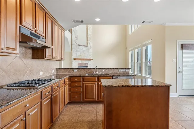 a view of room with a ceiling fan and window