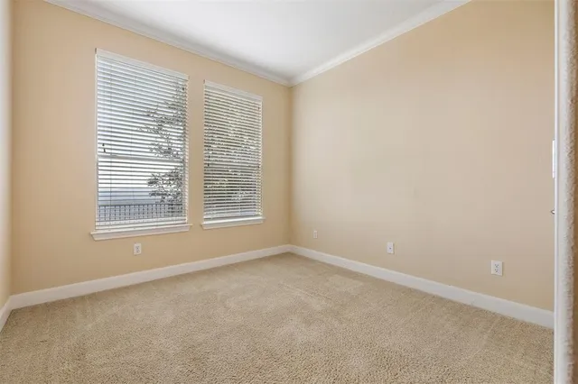 a view of a hallway with bathroom and bathroom