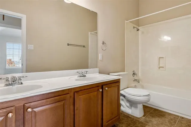 a view of a hallway with windows