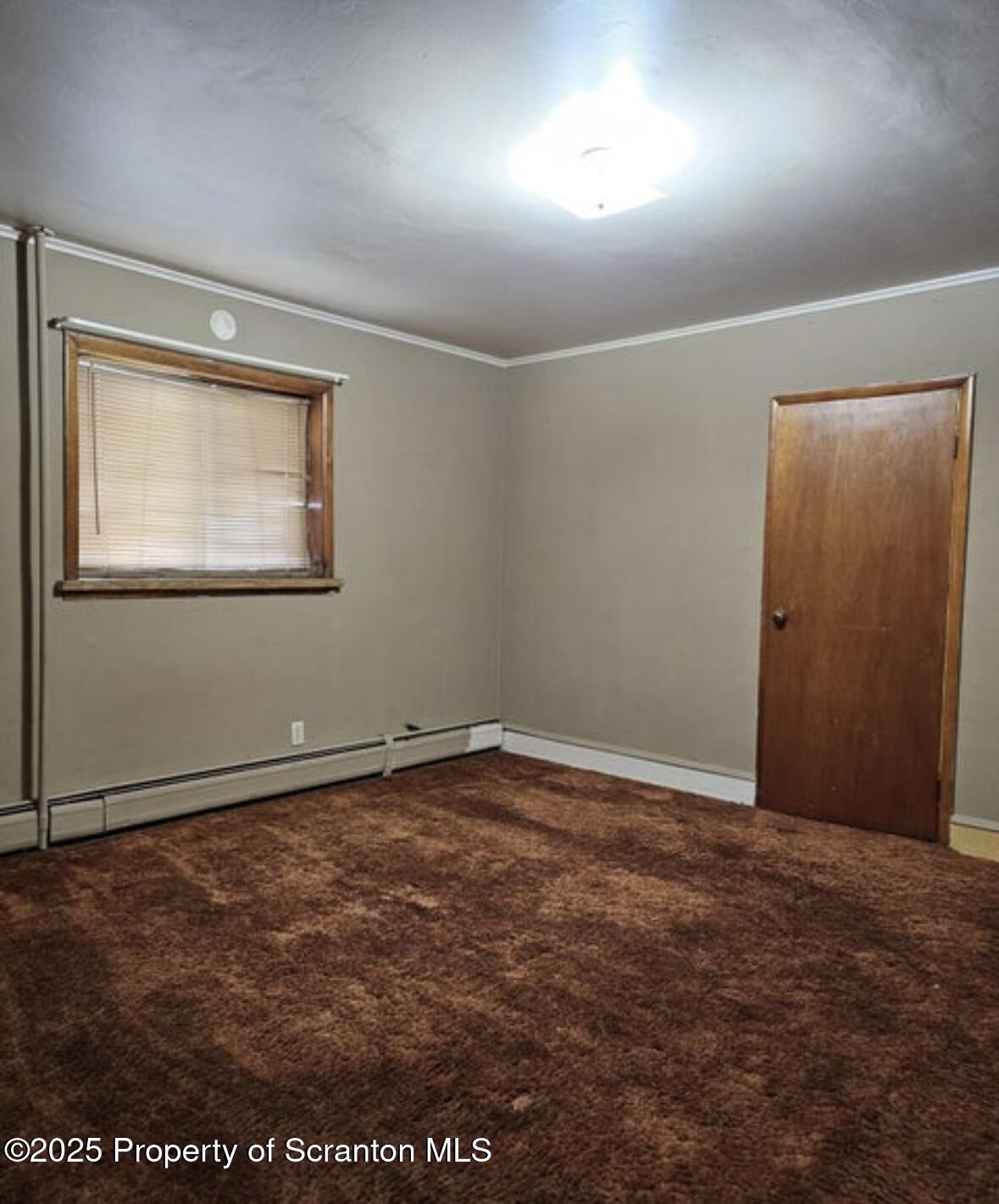 717-719 Prospect Avenue Scranton, PA 18505 - Photo 5 of 6 an empty room with windows