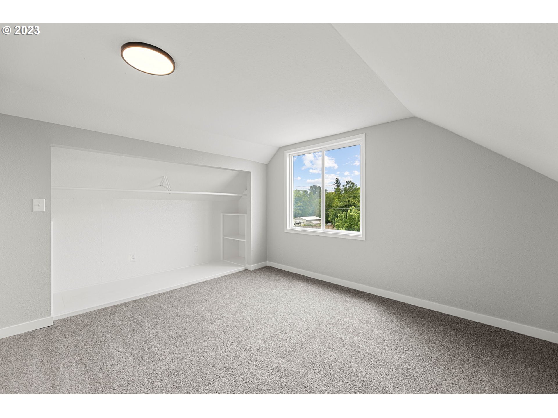 19308 Northeast Davis Road Brush Prairie, WA 98606 - Photo 19 of 45 a view of an empty room with a window