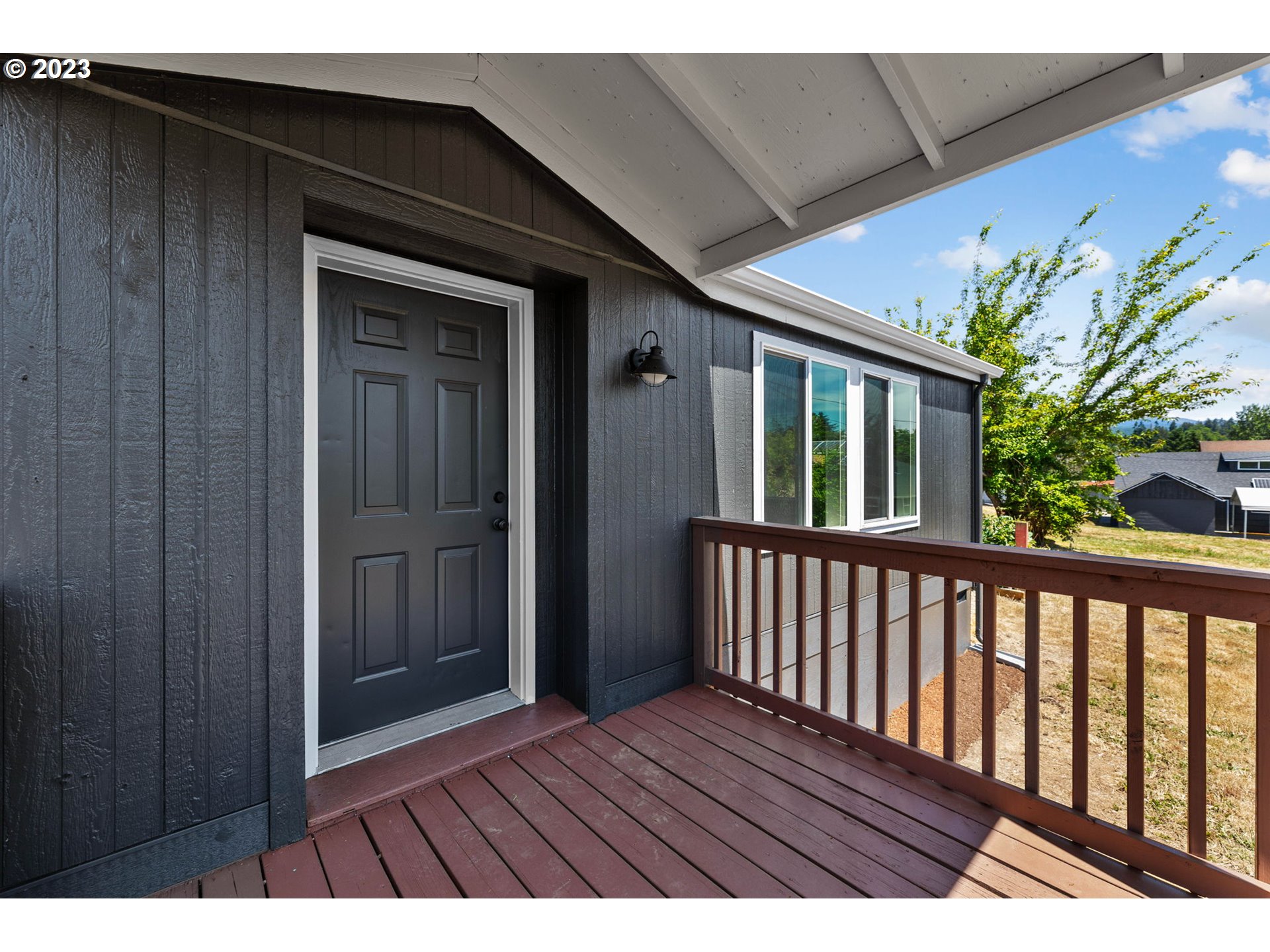 19308 Northeast Davis Road Brush Prairie, WA 98606 - Photo 29 of 45 a view of backyard with wooden floor and fence