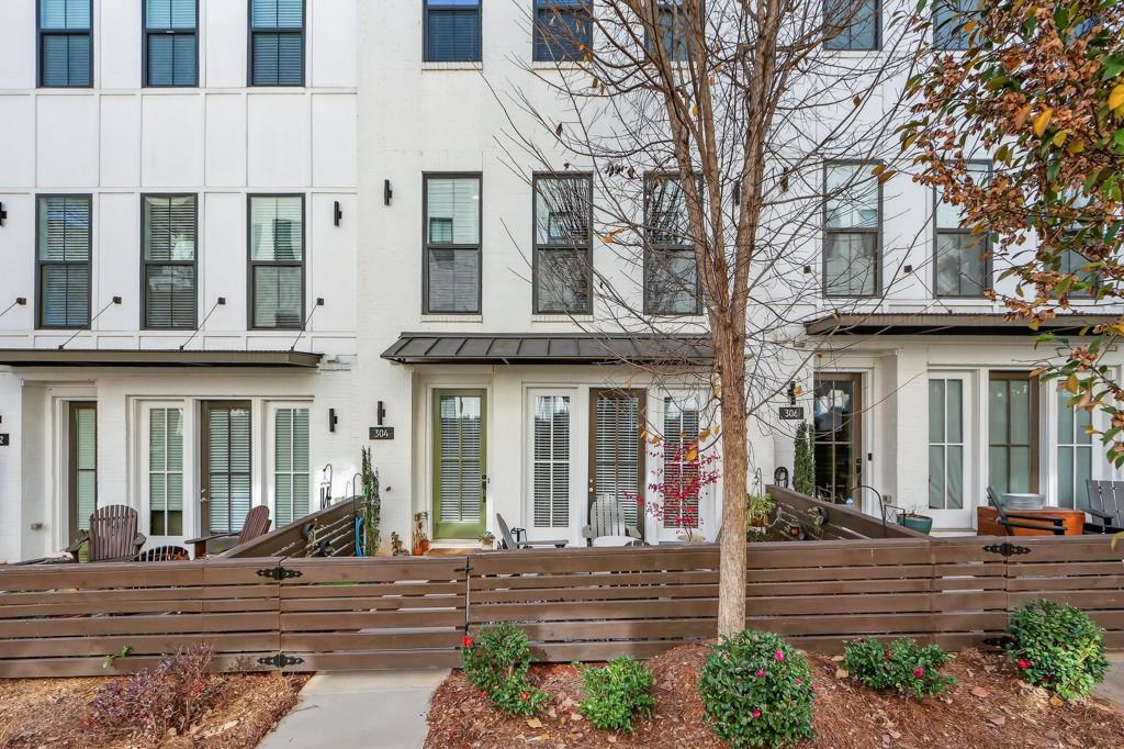 304 Liberty Way Woodstock, GA 30188 - Photo 2 of 42 a view of a building with a outdoor space