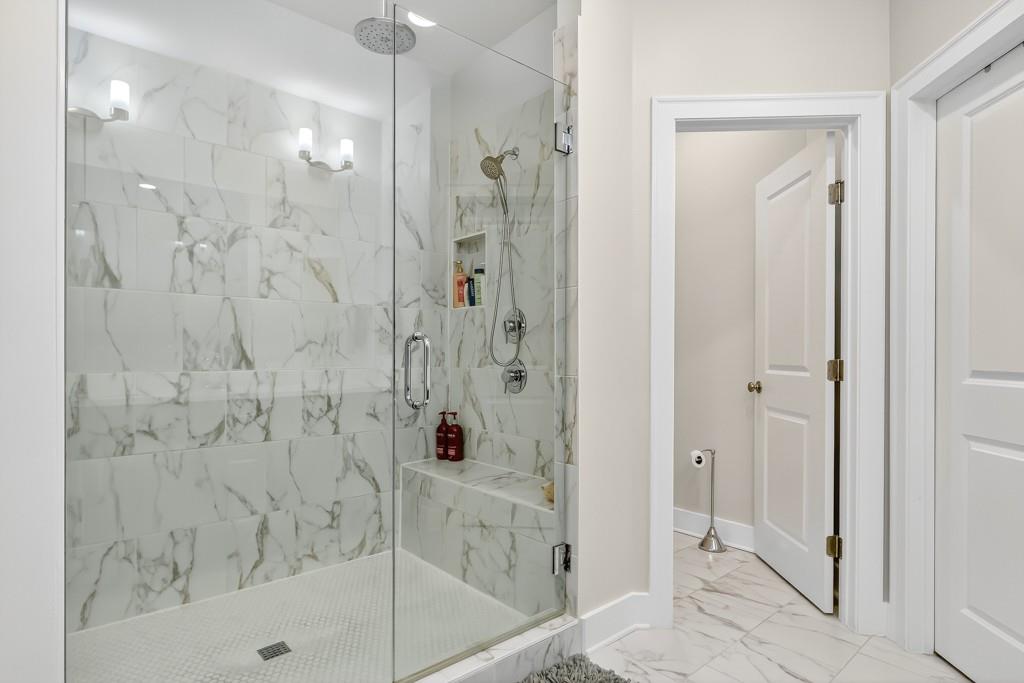 304 Liberty Way Woodstock, GA 30188 - Photo 22 of 42 a bathroom with a shower