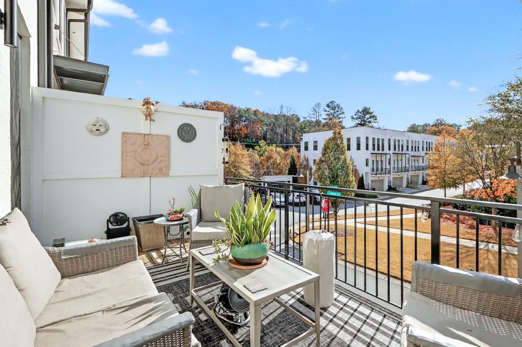 304 Liberty Way Woodstock, GA 30188 - Photo 25 of 42 a view of a balcony with furniture