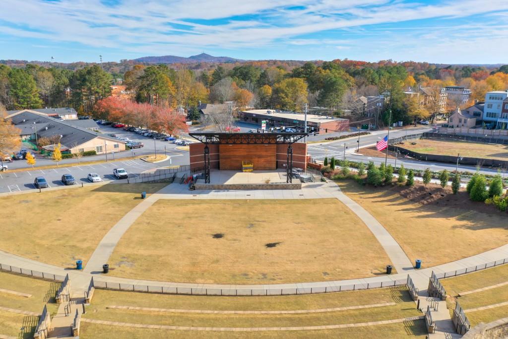 304 Liberty Way Woodstock, GA 30188 - Photo 34 of 42 a view of a swimming pool with an outdoor seating