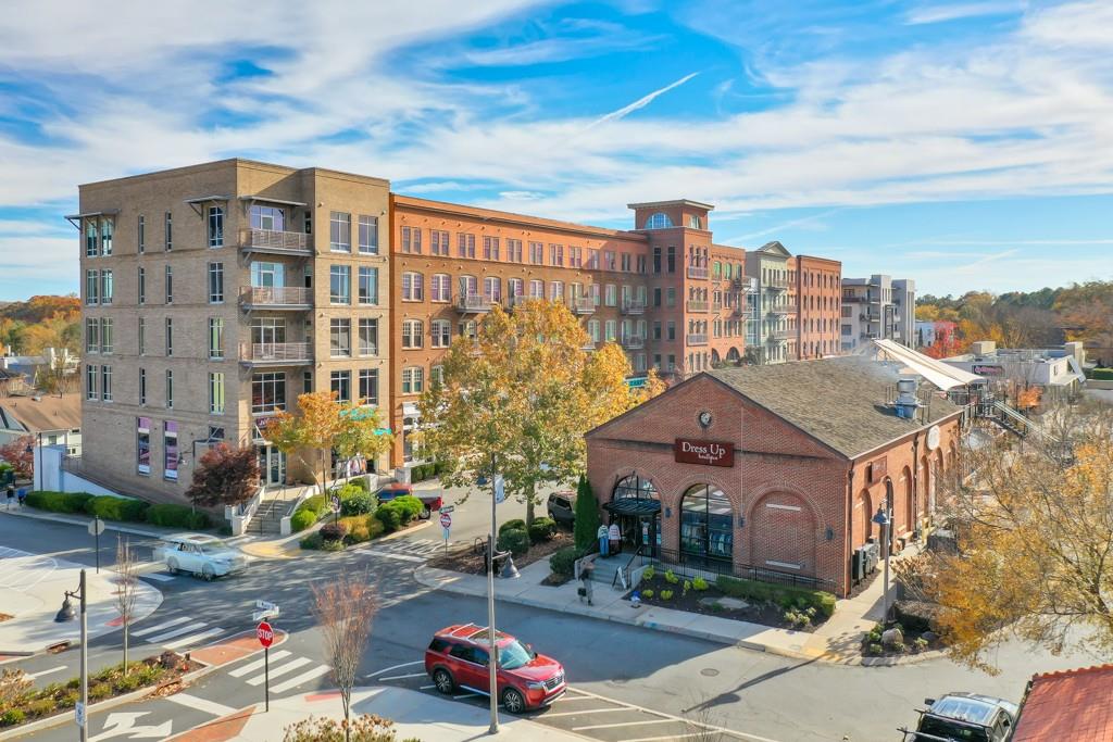 304 Liberty Way Woodstock, GA 30188 - Photo 36 of 42 a front view of a house with a yard