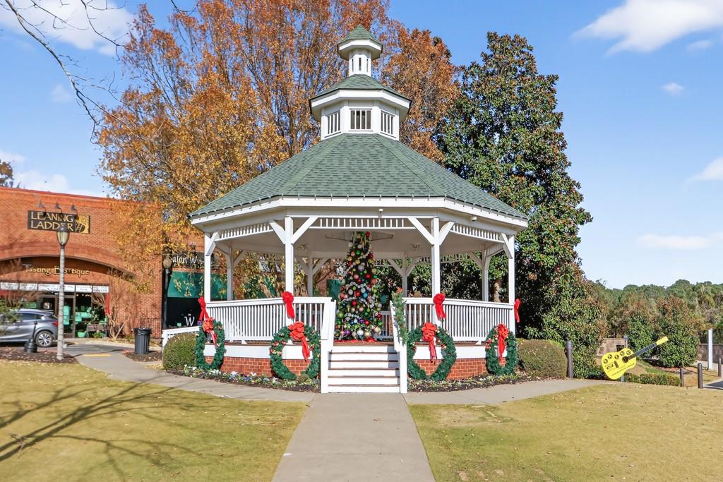 304 Liberty Way Woodstock, GA 30188 - Photo 42 of 42 a view of a building with the trees in the background