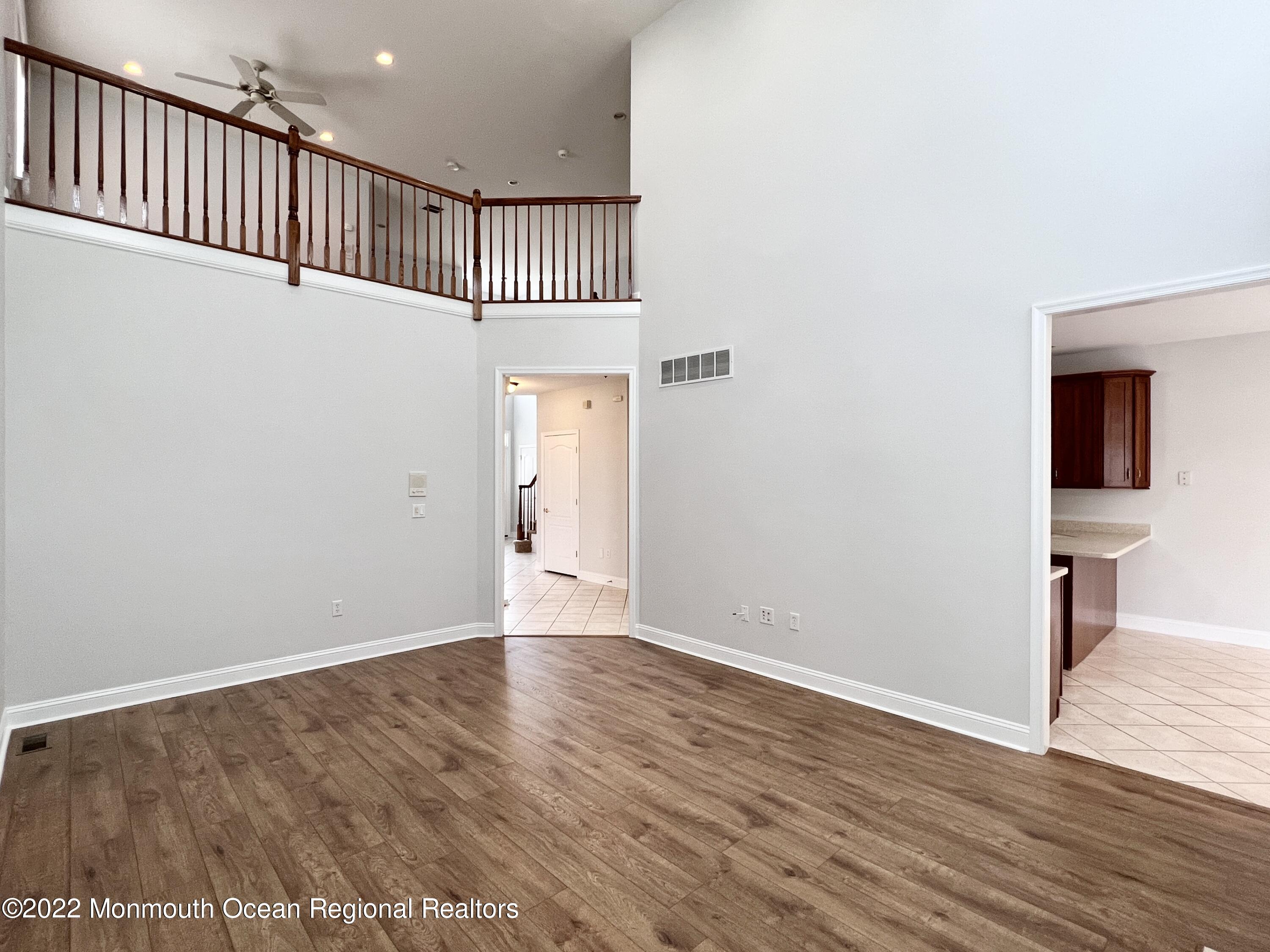 1 Hendrickson Court Manalapan, NJ 07726 - Photo 13 of 39 a view of entryway with wooden floor