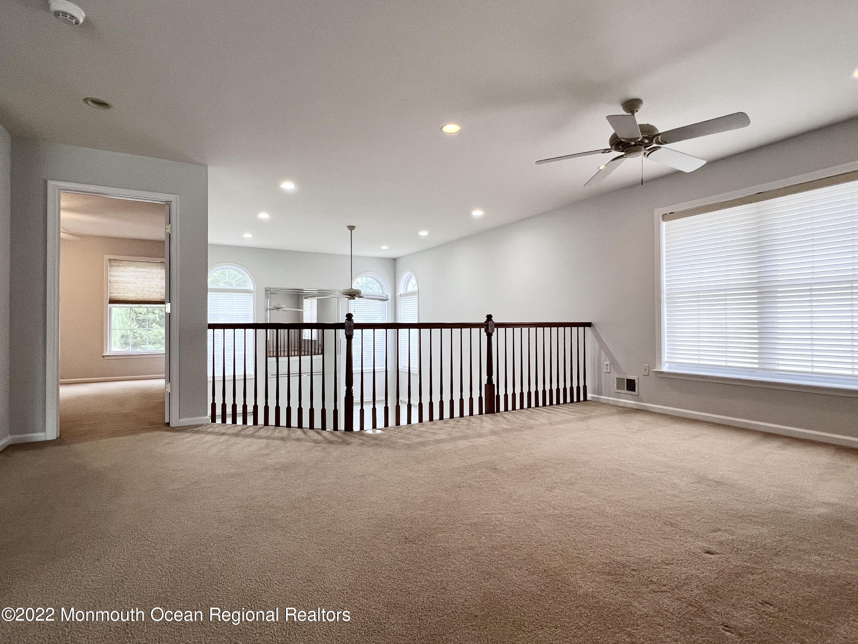 1 Hendrickson Court Manalapan, NJ 07726 - Photo 24 of 39 wooden floor in an empty room