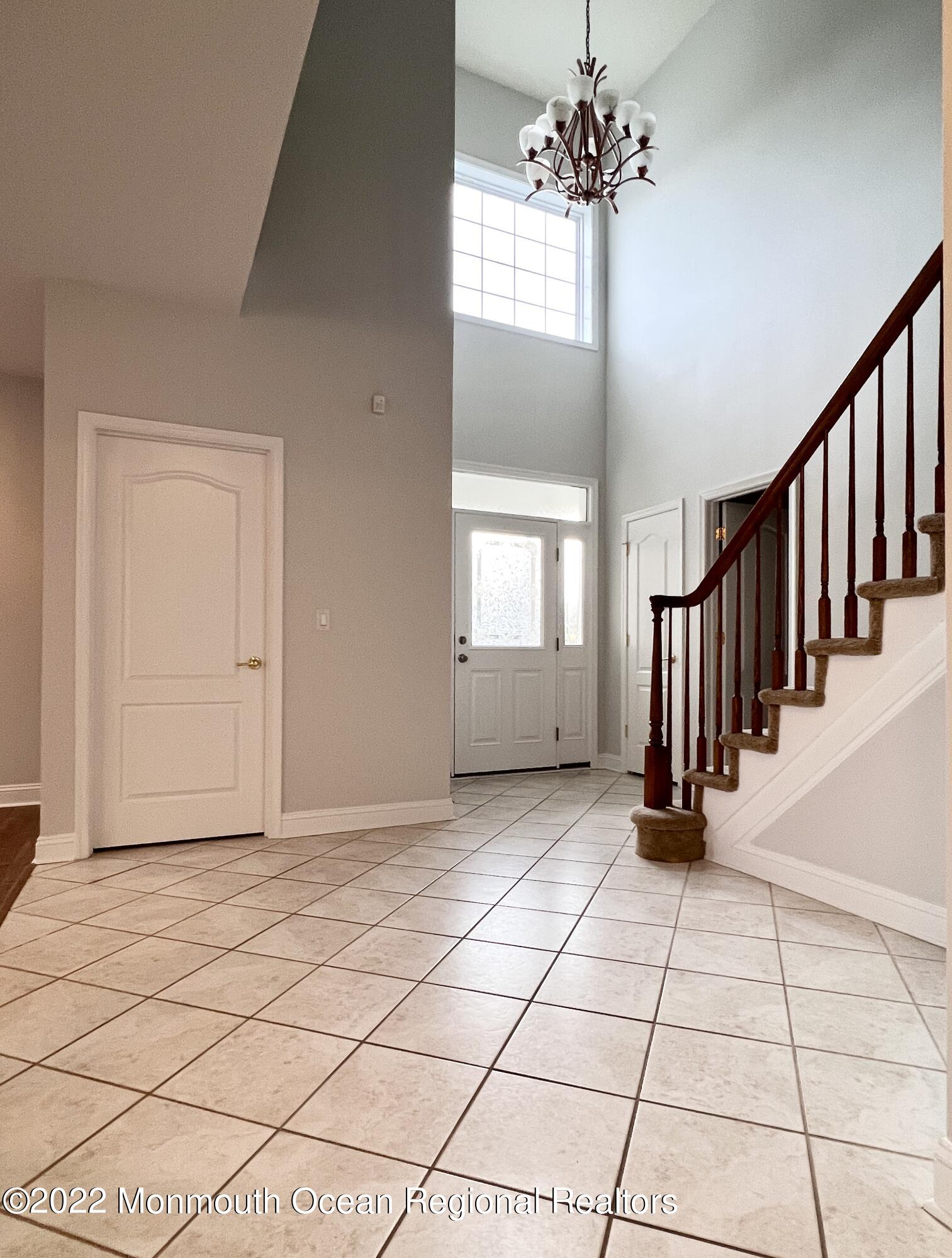 1 Hendrickson Court Manalapan, NJ 07726 - Photo 4 of 39 a view of an empty room with a window