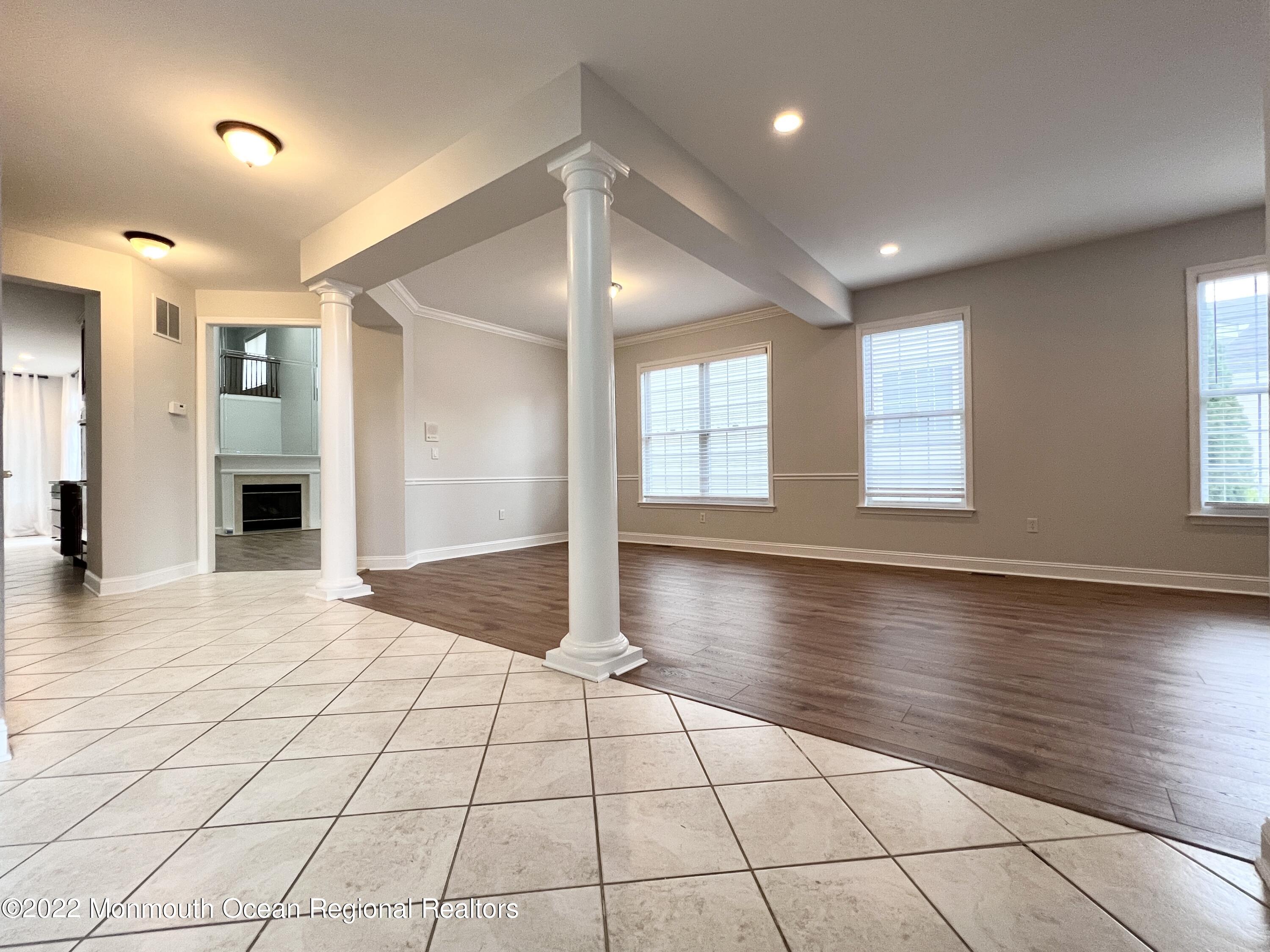 1 Hendrickson Court Manalapan, NJ 07726 - Photo 6 of 39 a view of an empty room and window