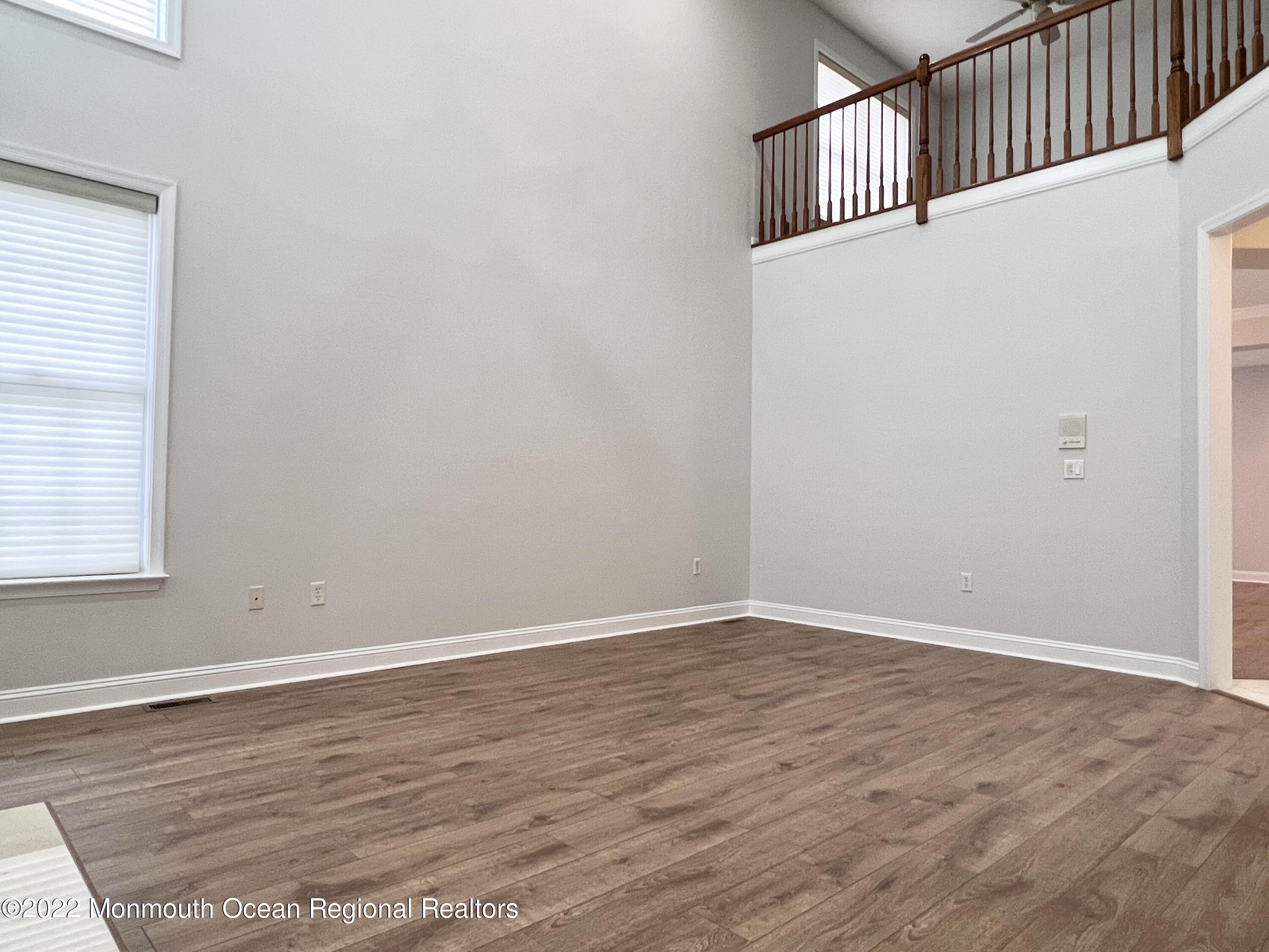 1 Hendrickson Court Manalapan, NJ 07726 - Photo 10 of 39 an empty room with wooden floor