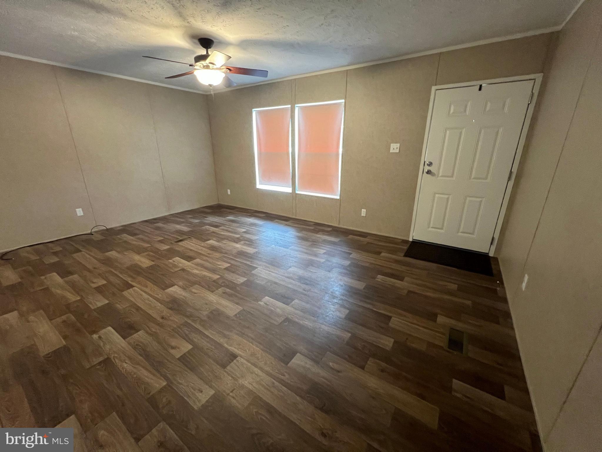 853 Janes Way High View, WV 26808 - Photo 15 of 35 wooden floor in an empty room with a window