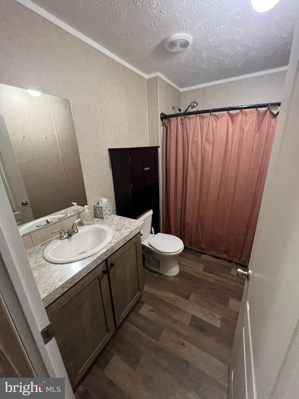 853 Janes Way High View, WV 26808 - Photo 19 of 35 a bathroom with a sink and a mirror