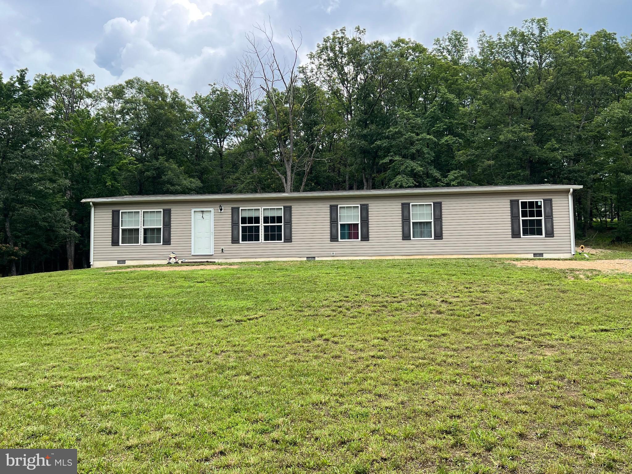 853 Janes Way High View, WV 26808 - Photo 2 of 35 a house view with a garden space