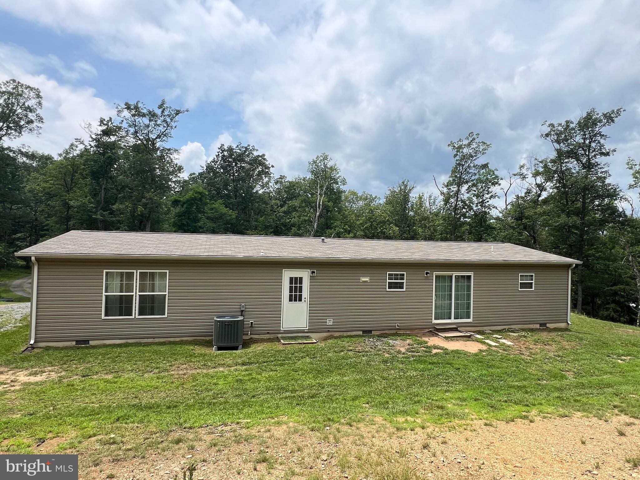853 Janes Way High View, WV 26808 - Photo 3 of 35 a house view with a backyard space