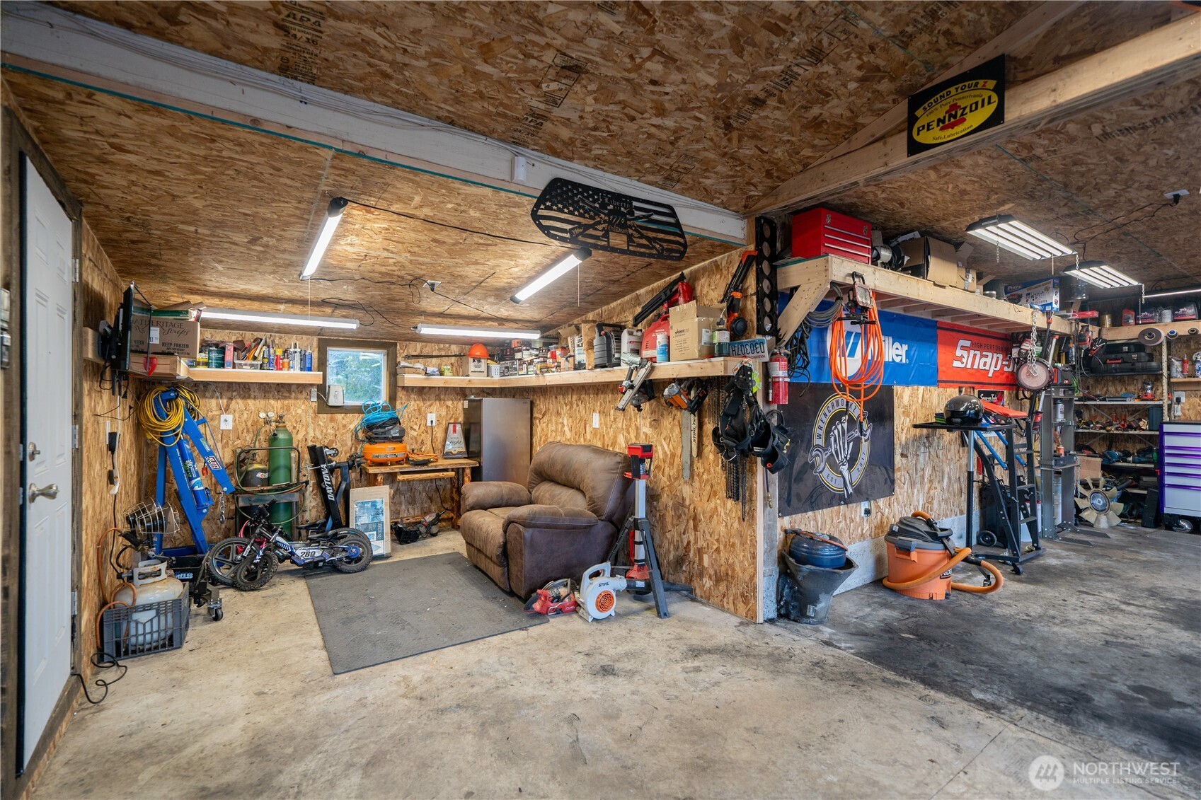 693 John Jacobs Road Port Angeles, WA 98362 - Photo 11 of 30 a view of a storage room with a lot of stuff