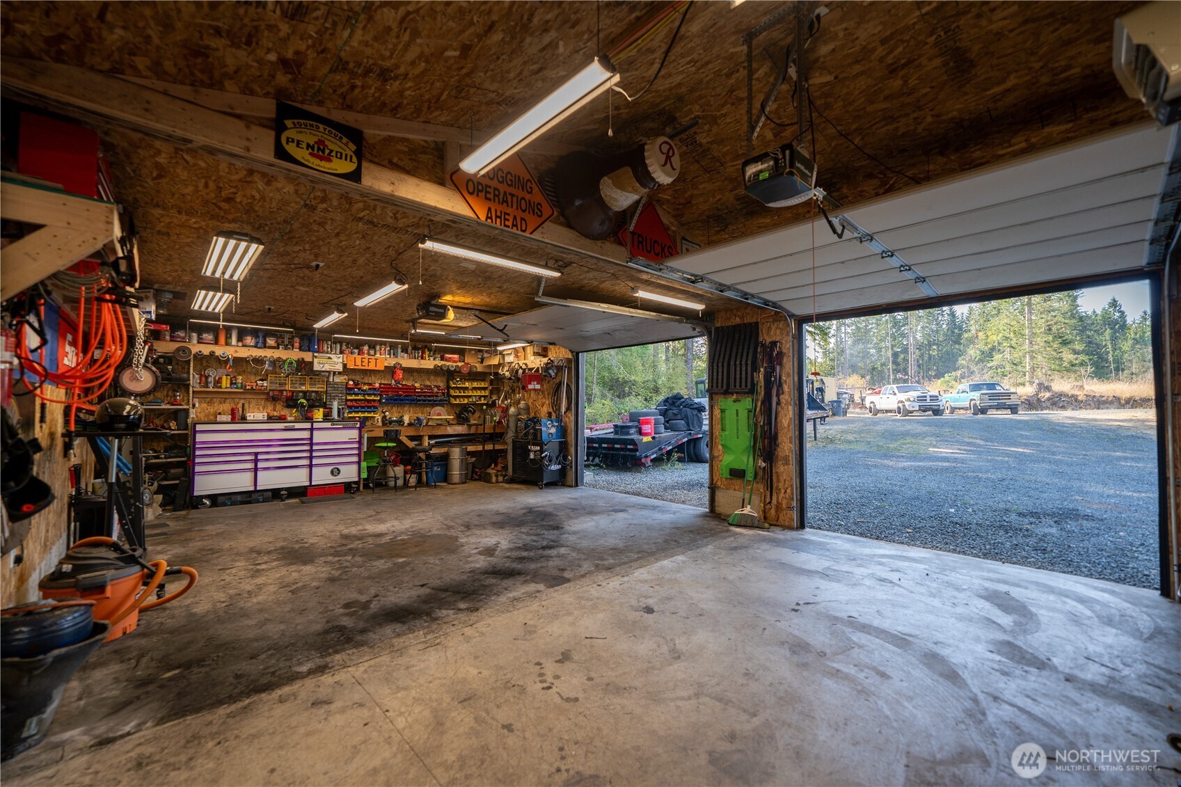 693 John Jacobs Road Port Angeles, WA 98362 - Photo 12 of 30 a view of a garage with an outdoor space
