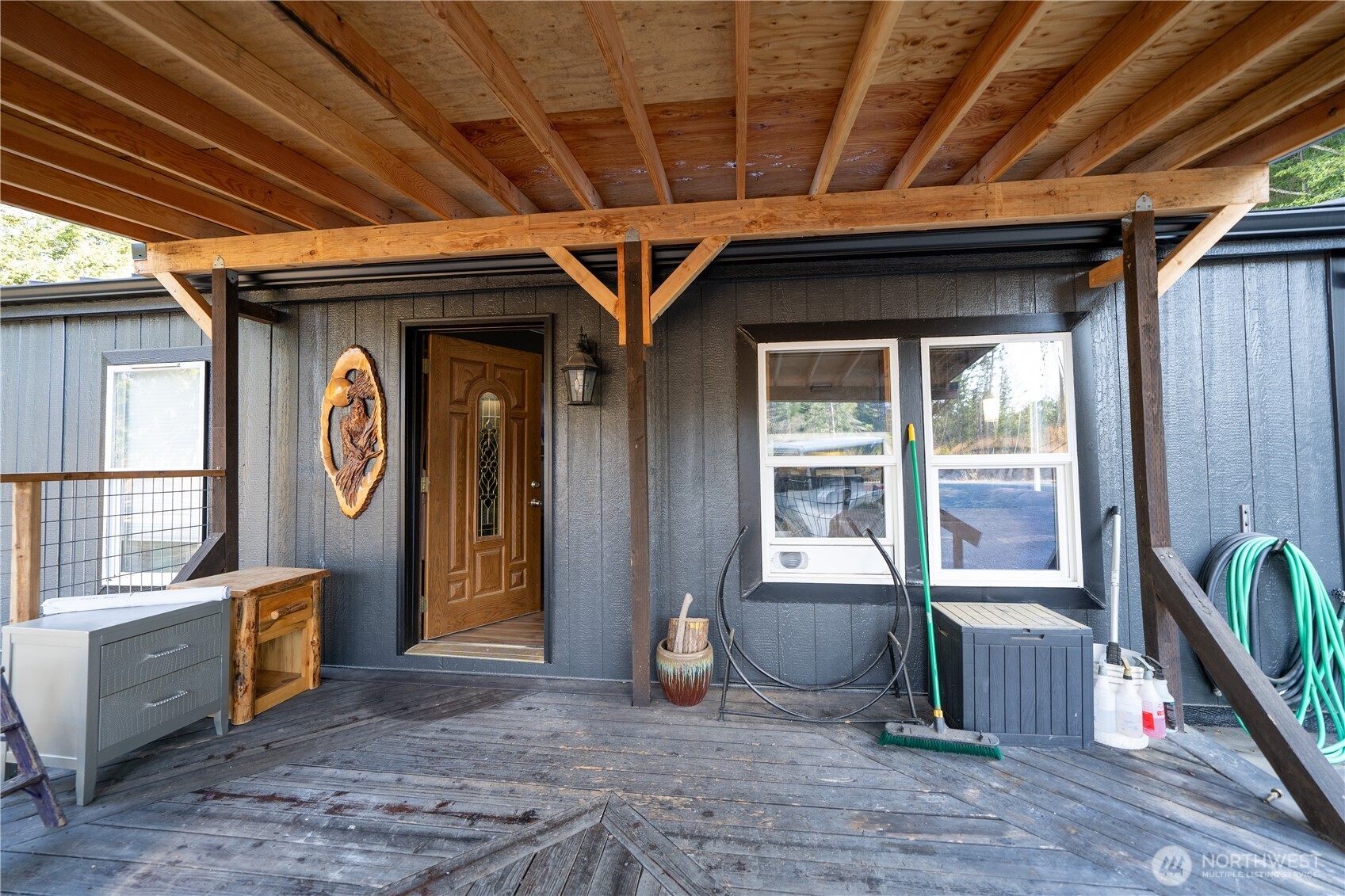 693 John Jacobs Road Port Angeles, WA 98362 - Photo 5 of 30 a view of an outdoor space with wooden floor and windows