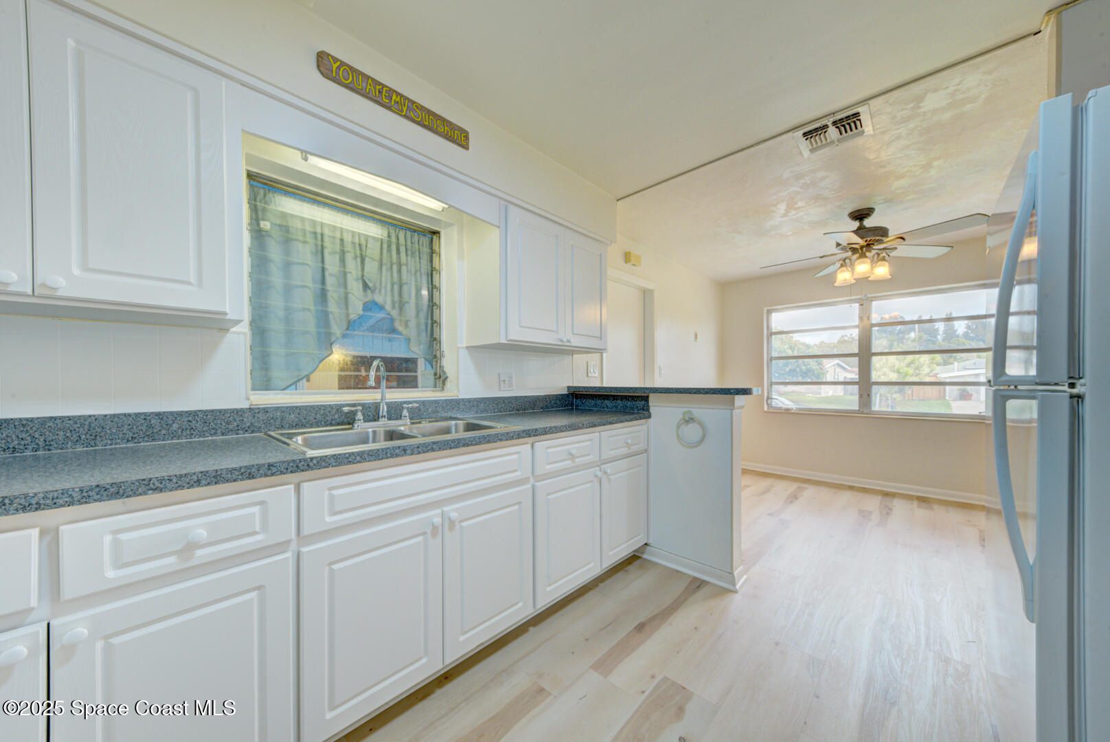 2433 Allan Adale Road Melbourne, FL 32935 - Photo 8 of 29 kitchen & dining room - Copy