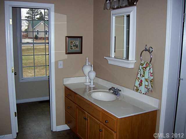 790 Mason Dickson Road York, SC 29745 - Photo 11 of 13 a bathroom with a sink vanity and a mirror