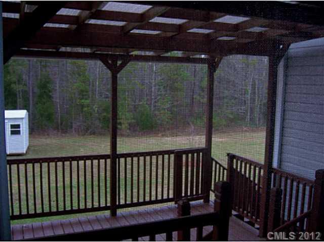 790 Mason Dickson Road York, SC 29745 - Photo 3 of 13 a view of a balcony with a swing