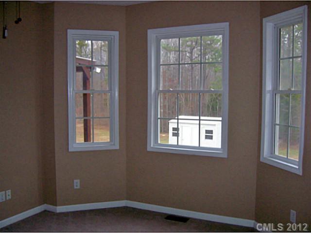 790 Mason Dickson Road York, SC 29745 - Photo 6 of 13 an empty room with windows