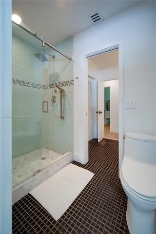a bathroom with a sink and a shower