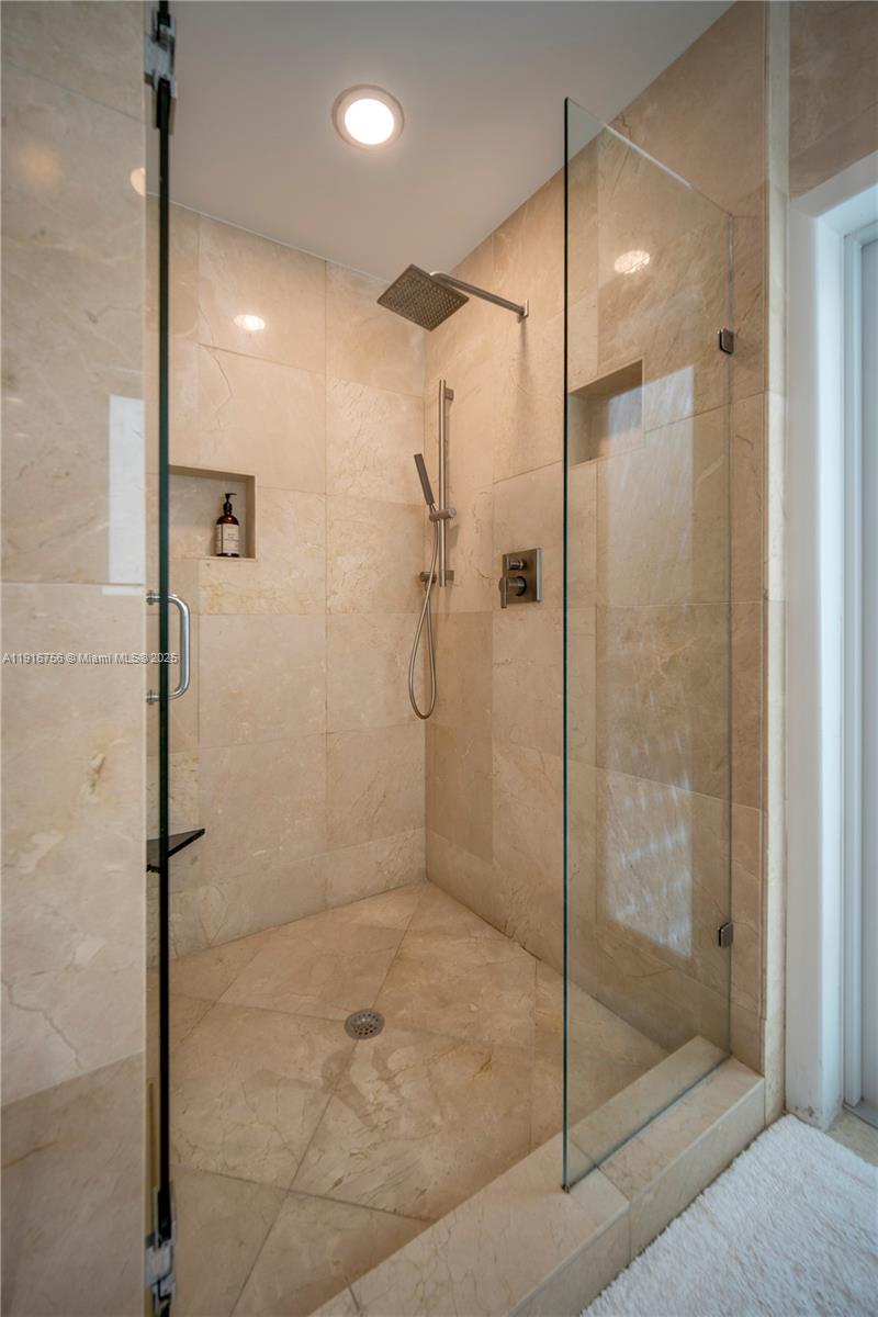 11905 Southwest 67th Avenue Pinecrest, FL 33156 - Photo 28 of 33 a bathroom with a shower
